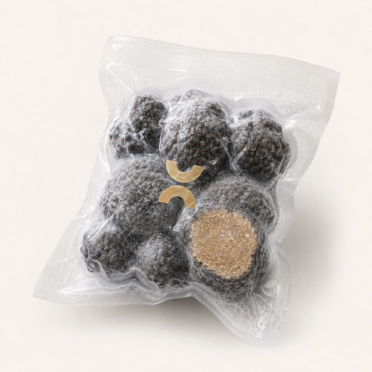 Frozen Summer Black Truffles Tuber aestivum vacuum packed for professional kitchens, retailers, distributors, truffle lovers